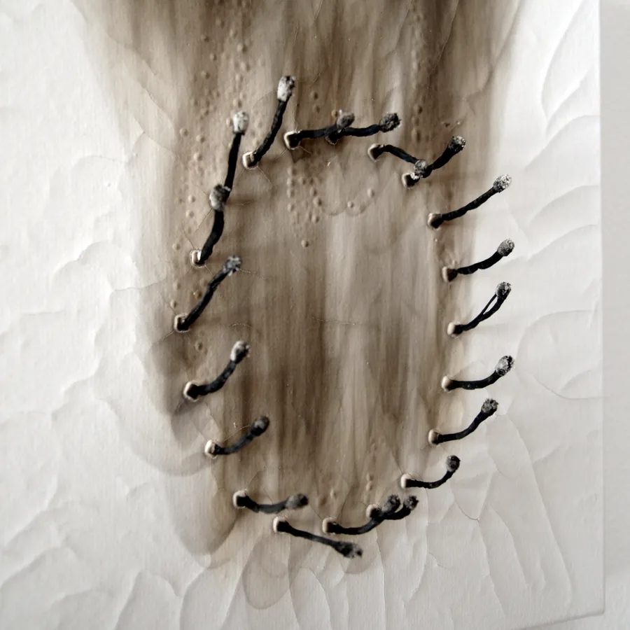 what love looks like (when you can't keep the fire burning), detail, one panel with the burnt matches