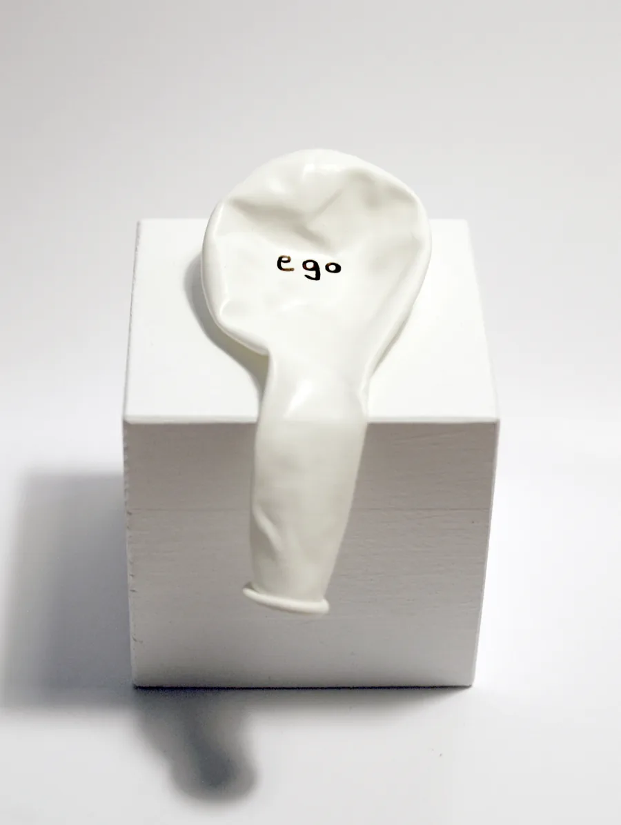 ego (geht eh), permanent marker on balloon, wooden base, © 2012