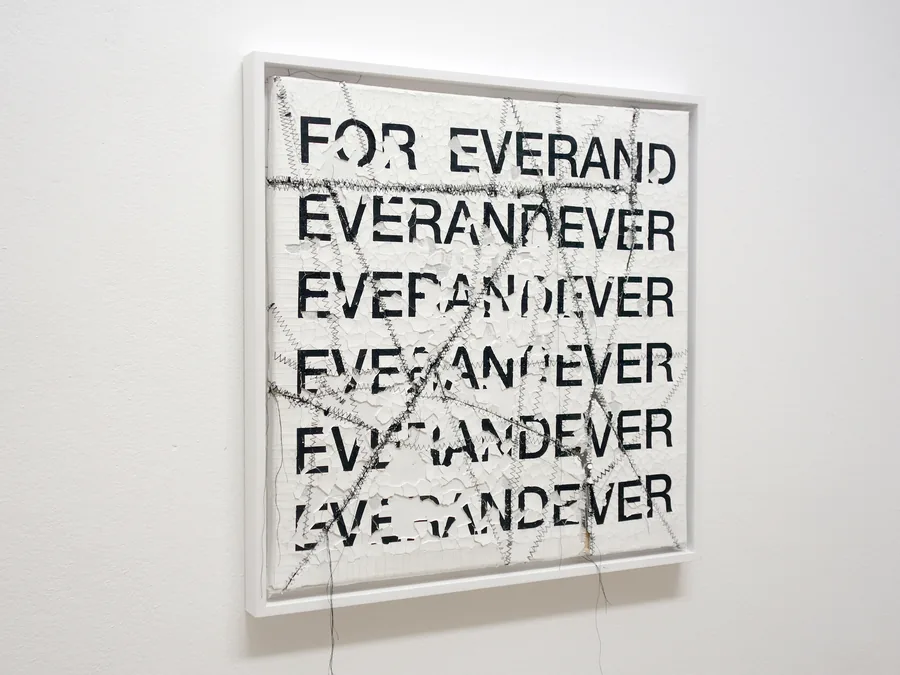 pretending, the framed work seen from the side