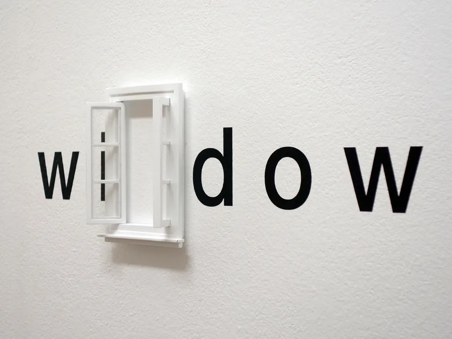 one word drama, detail, the small window standing where the n was