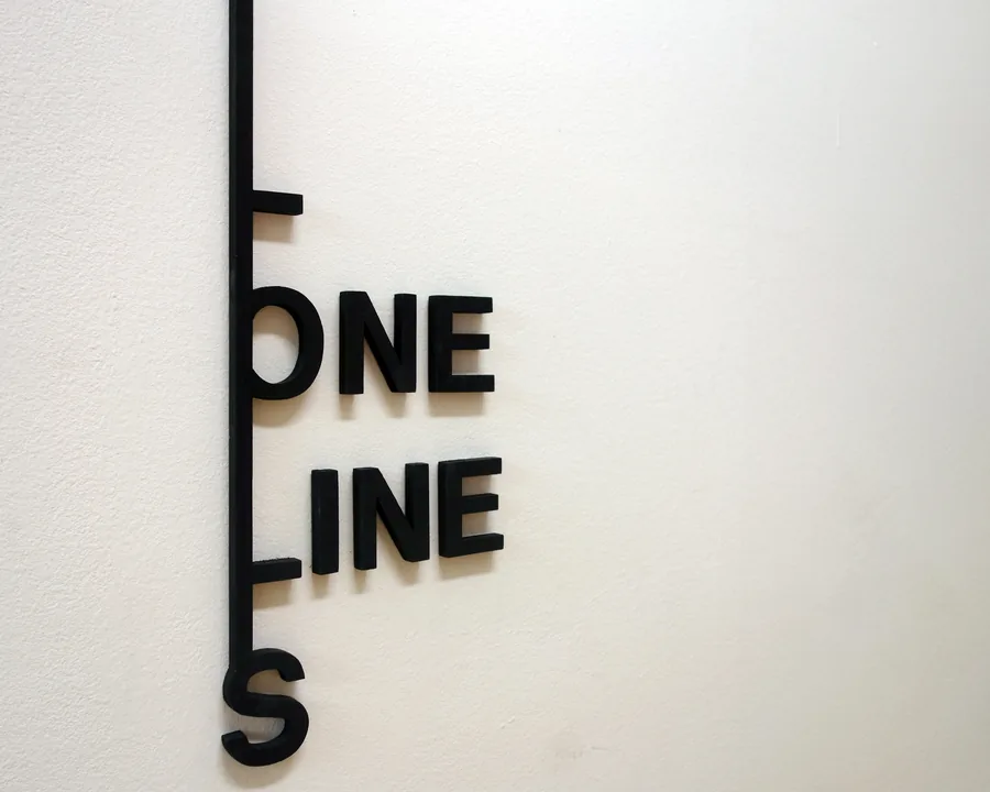 loneliness (one line), detail, the letters hanging on the line
