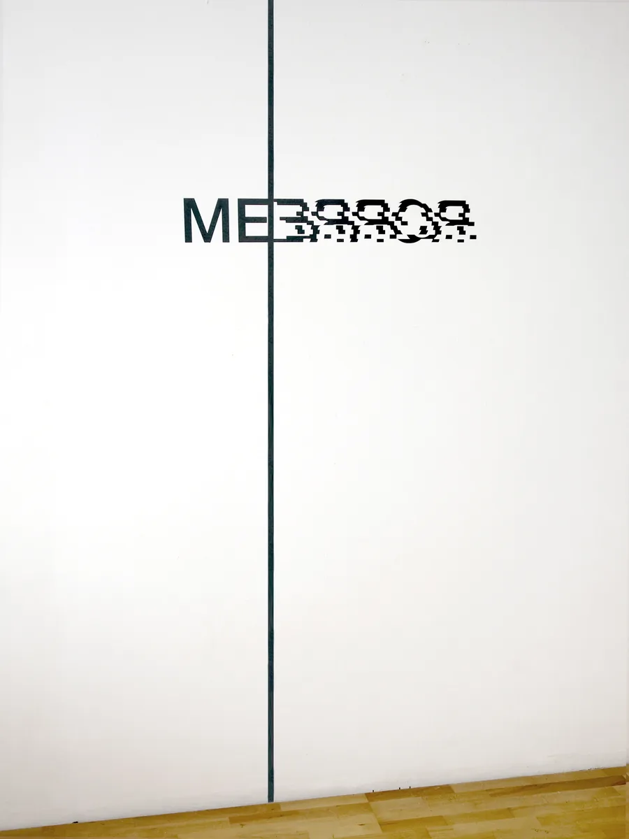 merror, the word on the wall beside the dark seam