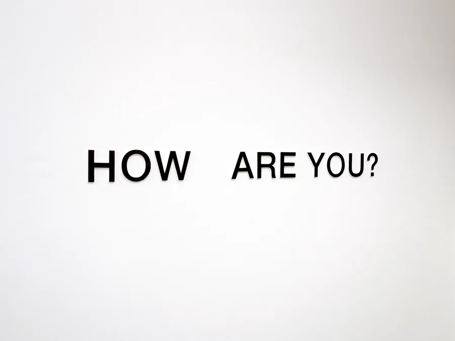 what a question, the letters on the wall, the question growing fainter