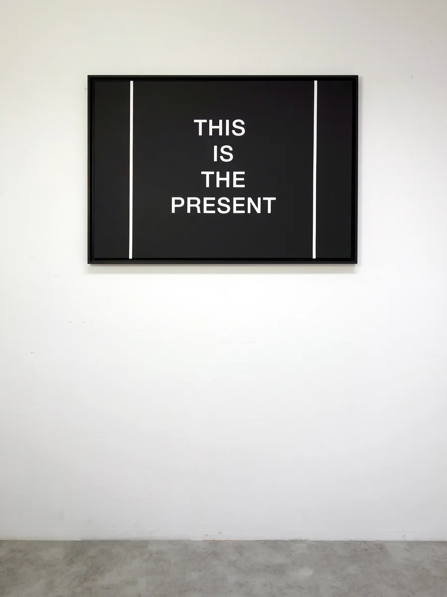 the present is a present, the framed work on the wall