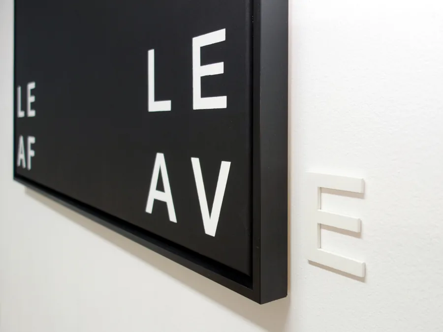 four seasons, detail, the single letter beside the panel