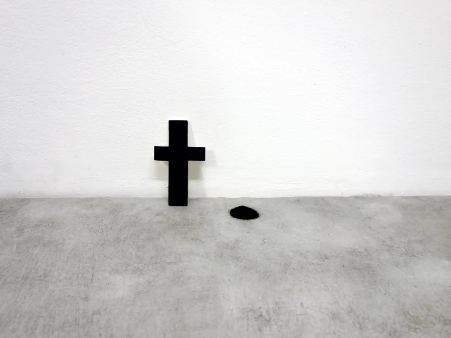 no matter how you turn it, the letter standing upright on the floor