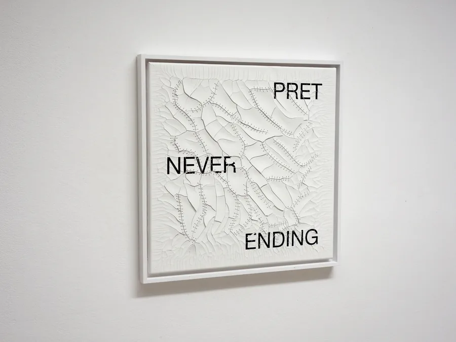 never ending, the framed work on the wall