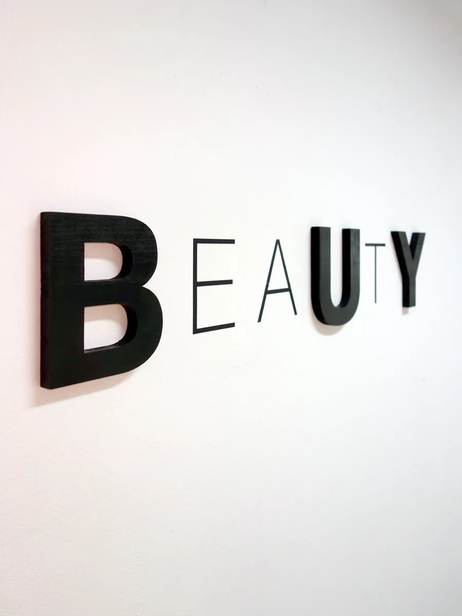buy more & eat less?, seen from the side, the letters of different weight