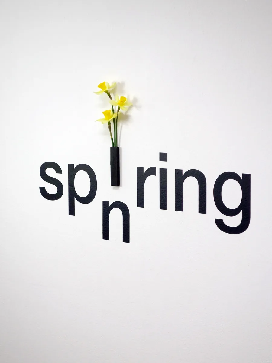 inspiring, the daffodils standing in the letter