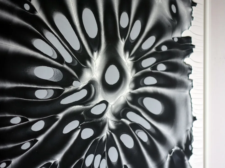 behind the surface, detail of the burst surface