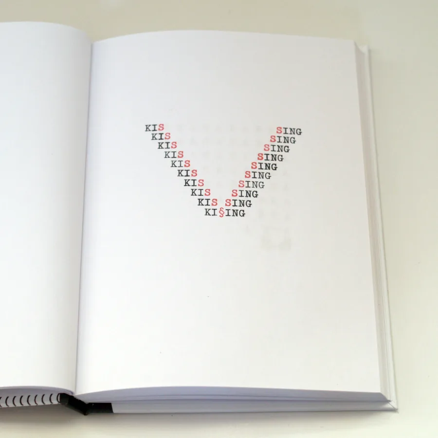 2 4get her, an open page with kissing set in red and black