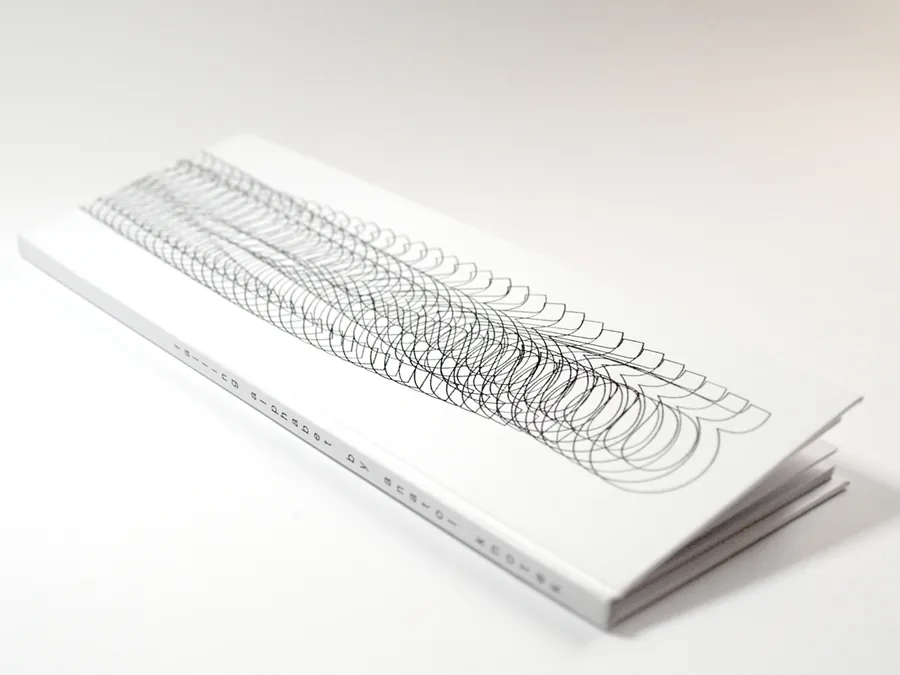 falling alphabet, the long narrow book seen from the side